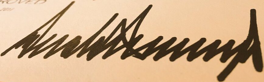 Donald Trump signature on a bill signed in December 2017
